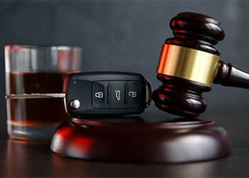 57729-law-hammer-alcohol-and-car-keys-on-wooden-table-c80d7412.jpg