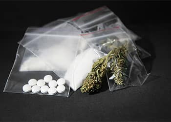 87691-drugs-on-table-7961d45d.jpg
